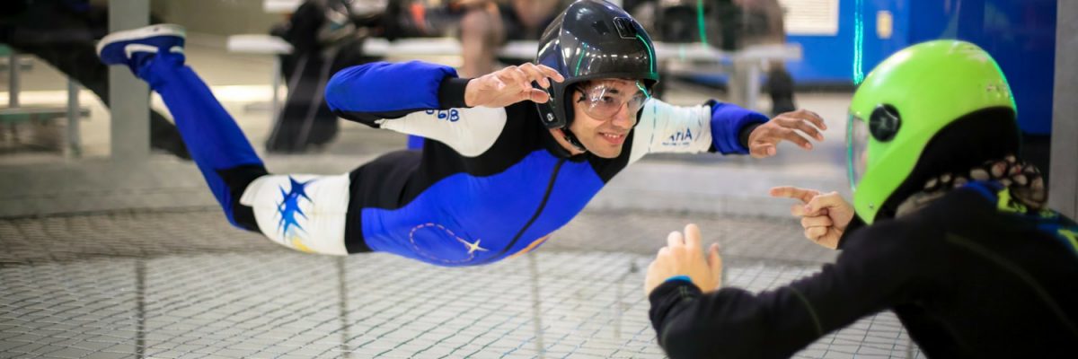 indoor skydiving beginner with instructor