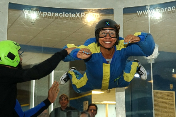 woman experiences flight in vertical wind tunnel
