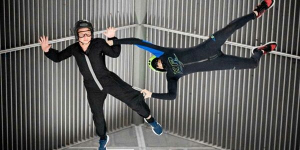 Indoor skydivers in the top of the tunnel